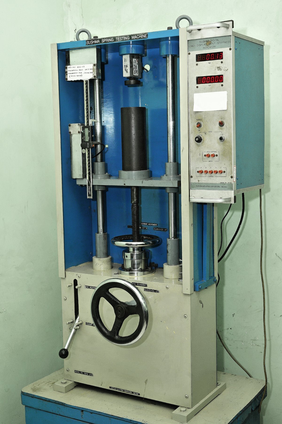 Spring load testing machine used for quality assurance at Automatic Spring Industries